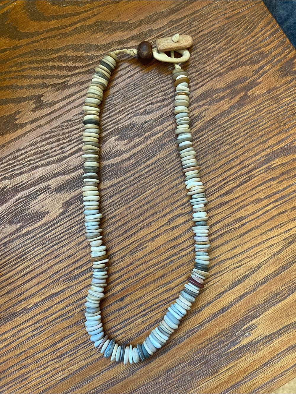 Artisan Boutique stone necklace in leather. Hand drilled and made.